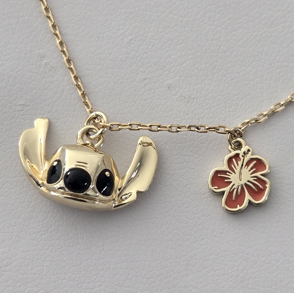Stitch Gold-Tone Necklace with Hibiscus Flower & Crystal Accents - Picture 2 of 11